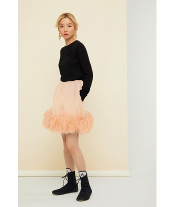 Feather-embellished pleated skirt s'inspire de l'anatomie humaine